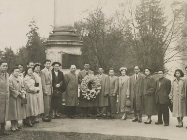 Group standing in front of the cenotaph in Stanley Park, Vancouver, BC, circa 1950s. Tanaka Family Collection.