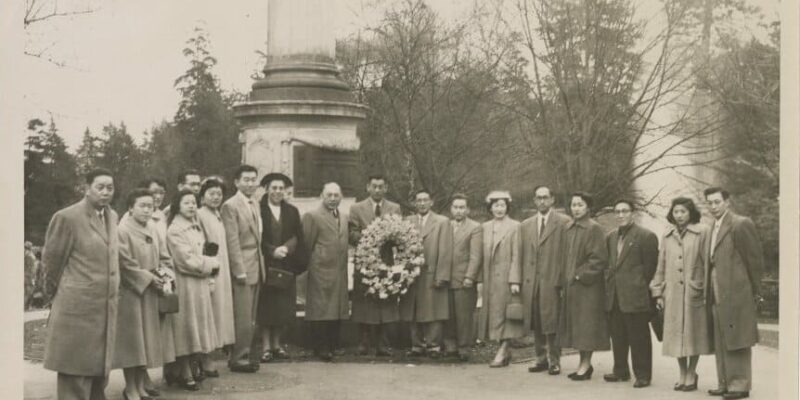 Group standing in front of the cenotaph in Stanley Park, Vancouver, BC, circa 1950s. Tanaka Family Collection.